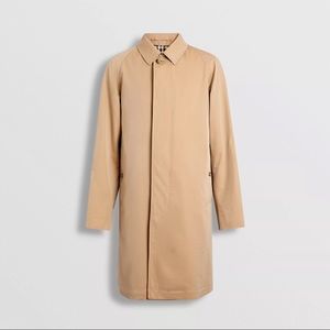 Gently used large Burberry car coat in color honey. Has all original buttons.